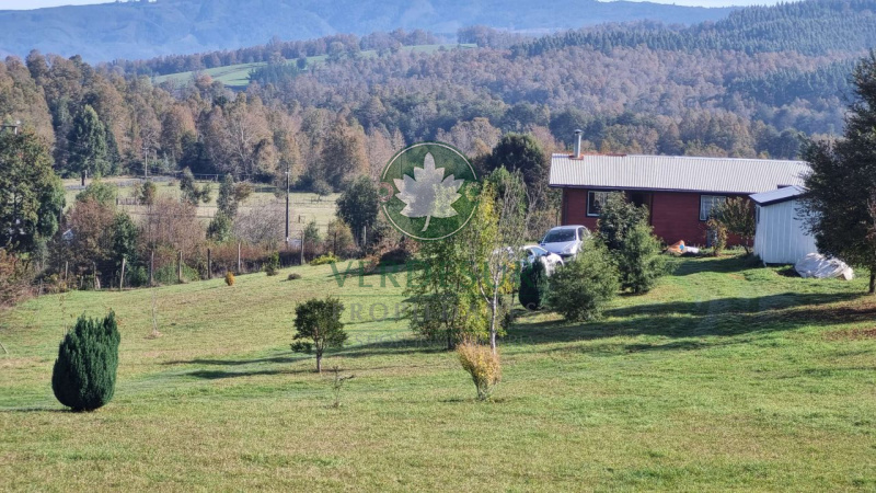 parcela con casa en venta