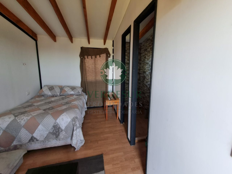 parcela con casa en venta